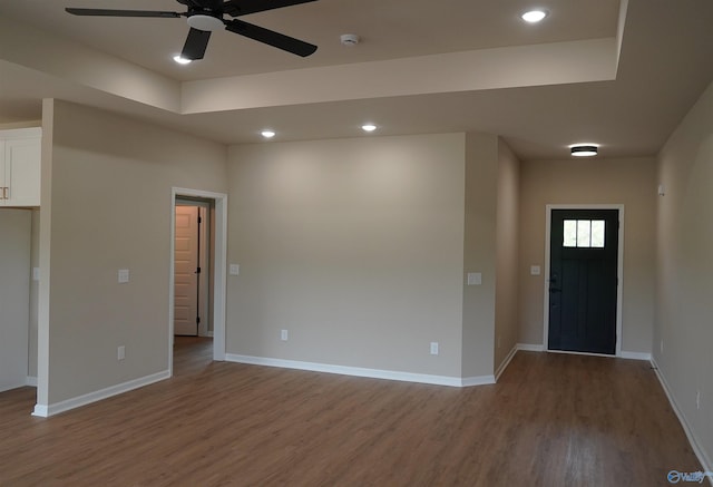 entryway featuring baseboards, recessed lighting, wood finished floors, and a ceiling fan