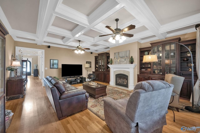 201 Atwater Dr, Madison, AL 35756 - living room featuring a ceiling fan, a fireplace, coffered ceiling, light wood-style floors, and beam ceiling