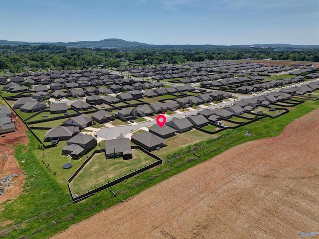 drone / aerial view featuring a mountain view