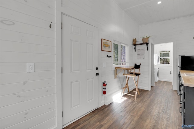 entrance foyer with dark hardwood / wood-style flooring