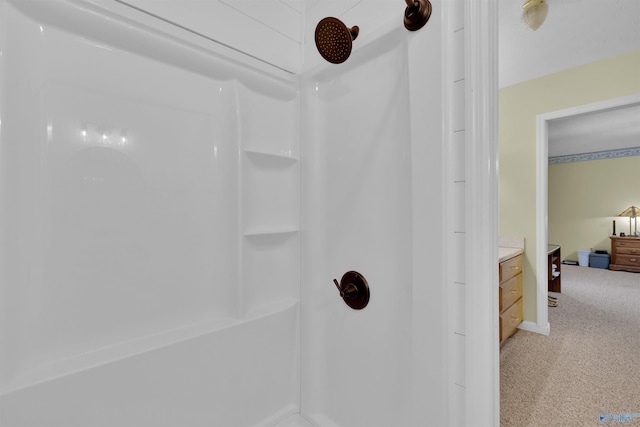 bathroom featuring vanity and walk in shower