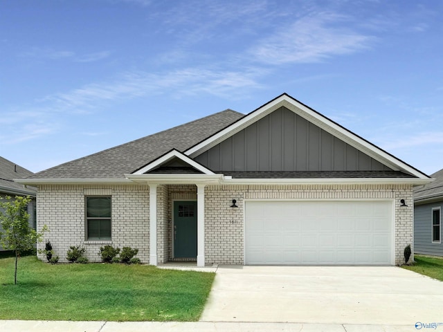 104 Granby Ln, Huntsville, AL 35811 - ranch-style home featuring driveway, brick siding, roof with shingles, and a front yard