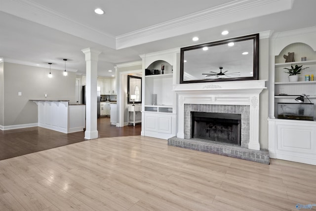 unfurnished living room with recessed lighting, ceiling fan, and crown molding