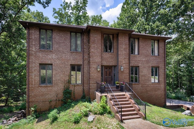 9046 Sugar Tree Trl, Huntsville, AL 35802 - colonial house featuring brick siding