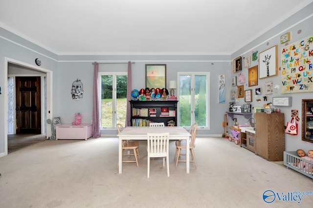 9046 Sugar Tree Trl, Huntsville, AL 35802 - carpeted dining room with ornamental molding and healthy amount of natural light