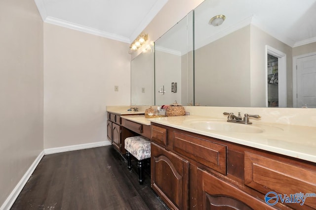 9046 Sugar Tree Trl, Huntsville, AL 35802 - bathroom featuring crown molding, double vanity, and wood finished floors
