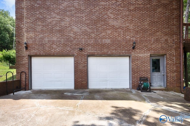 9046 Sugar Tree Trl, Huntsville, AL 35802 - garage featuring driveway