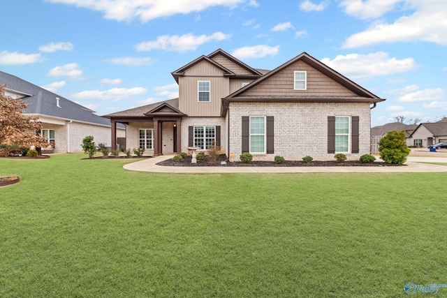 craftsman-style house featuring a front lawn