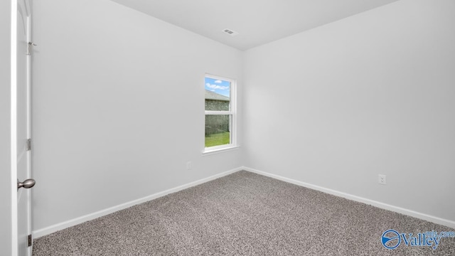 view of carpeted spare room