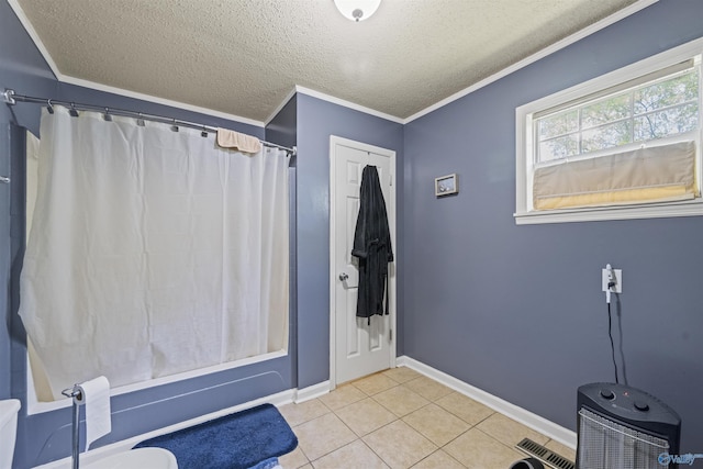 interior space with baseboards, ornamental molding, a textured ceiling, shower / bathtub combination with curtain, and tile patterned flooring