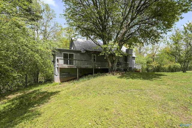 view of yard with a deck