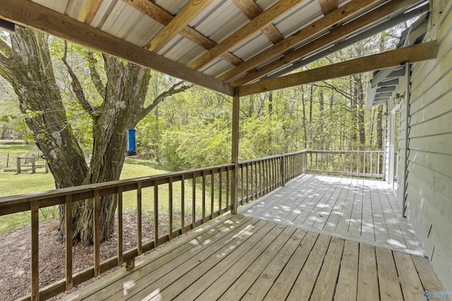 wooden deck with a yard