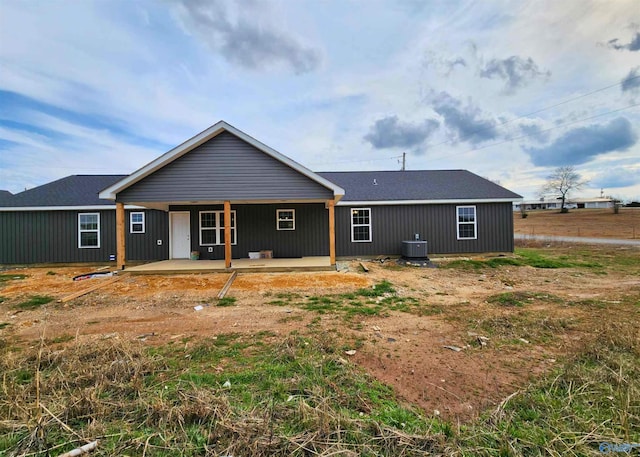 back of house featuring cooling unit and a patio