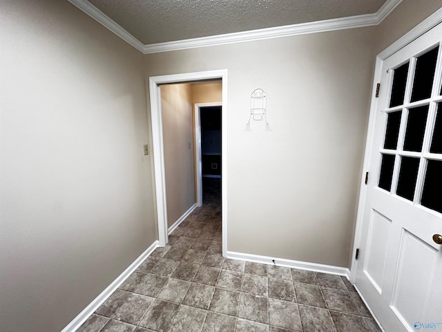 hallway with crown molding, baseboards, and a textured ceiling