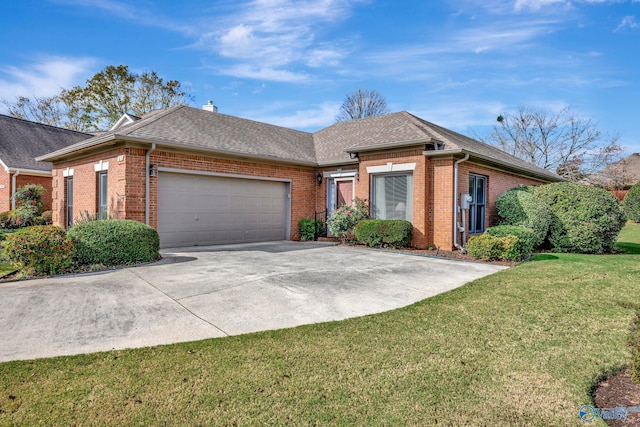 single story home featuring a front lawn and a garage