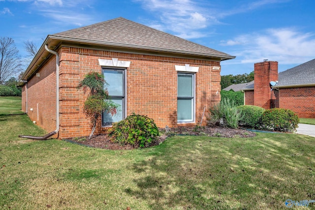 view of home's exterior featuring a lawn