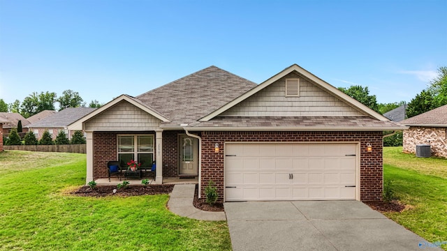 view of front of home with concrete driveway, a front yard, an attached garage, and brick siding