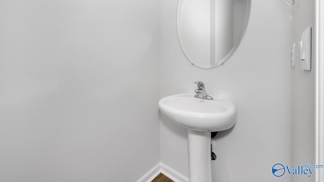 bathroom featuring baseboards