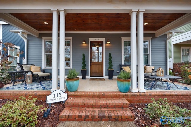 doorway to property with covered porch