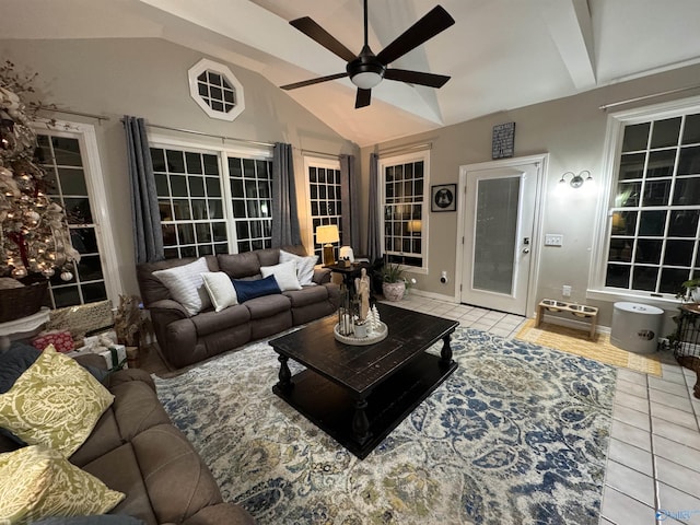 tiled living room with ceiling fan and lofted ceiling with beams