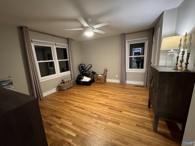 miscellaneous room with ceiling fan and light hardwood / wood-style floors