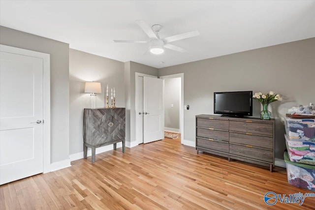 bedroom featuring ceiling fan and light wood-type flooring