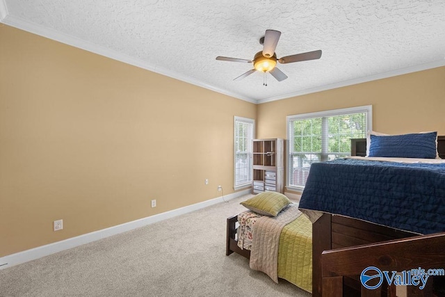 219 Sharp Dr, Gadsden, AL 35903 - bedroom with baseboards, light colored carpet, ornamental molding, a textured ceiling, and ceiling fan