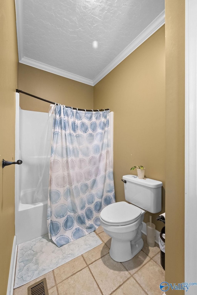 219 Sharp Dr, Gadsden, AL 35903 - bathroom with crown molding, toilet, and a textured ceiling