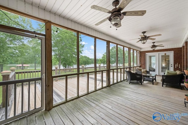 219 Sharp Dr, Gadsden, AL 35903 - sunroom / solarium featuring a ceiling fan, a water view, outdoor lounge area, and view of scattered trees