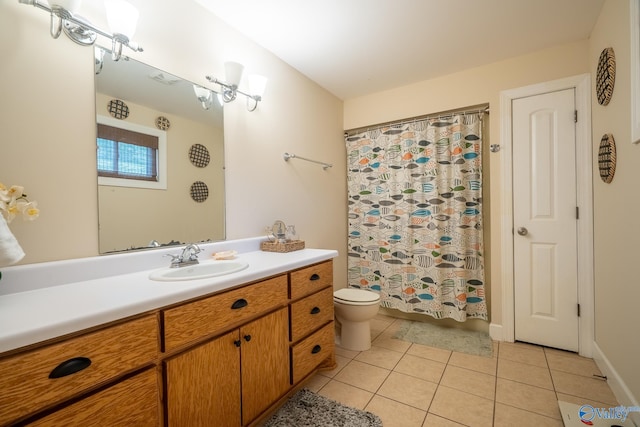 full bathroom with tile patterned floors, curtained shower, toilet, and vanity