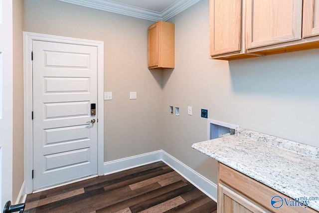 washroom featuring dark wood finished floors, crown molding, hookup for a washing machine, cabinet space, and baseboards