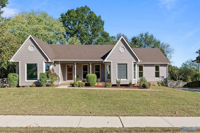 single story home with a front lawn