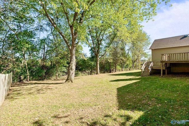 view of yard featuring a deck