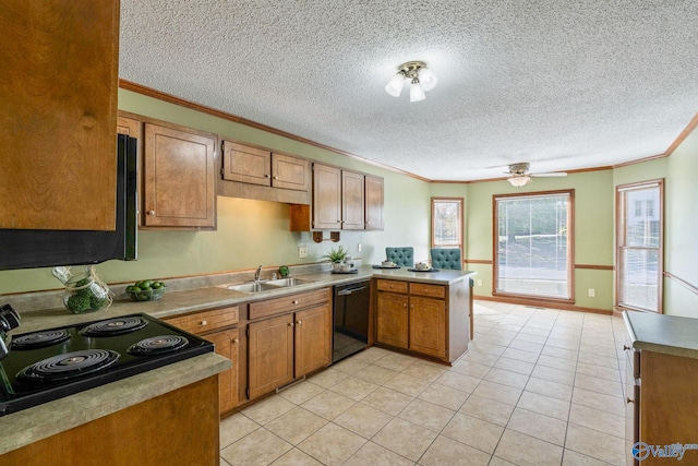 kitchen featuring crown molding, black appliances, sink, and kitchen peninsula