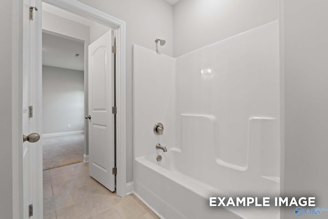 bathroom featuring  shower combination and tile patterned floors