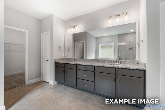 bathroom featuring vanity and walk in shower