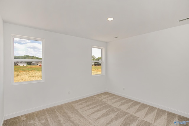 empty room with carpet floors