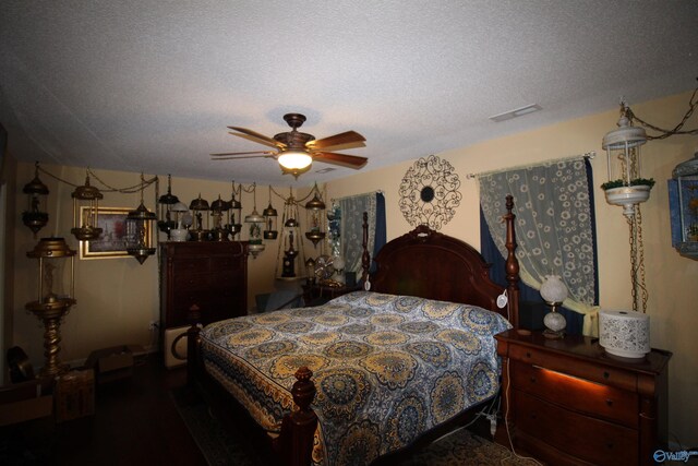 207 Brook Wind Dr, Hazel Green, AL 35750 - bedroom featuring a ceiling fan, visible vents, and a textured ceiling