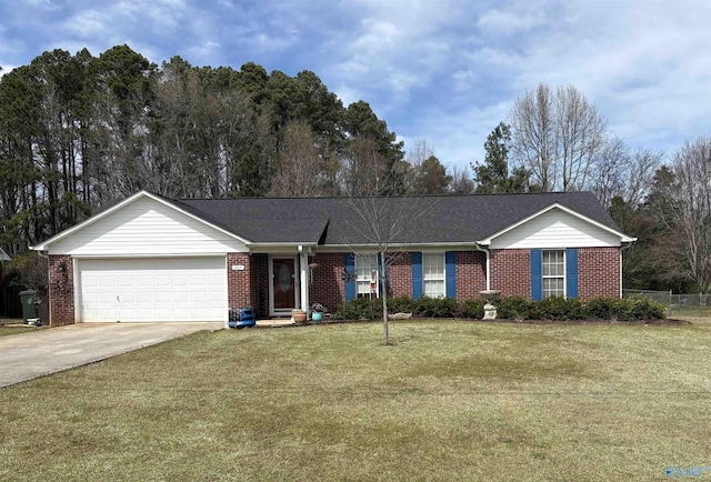 207 Brook Wind Dr, Hazel Green, AL 35750 - ranch-style home with concrete driveway, a front yard, brick siding, and a garage