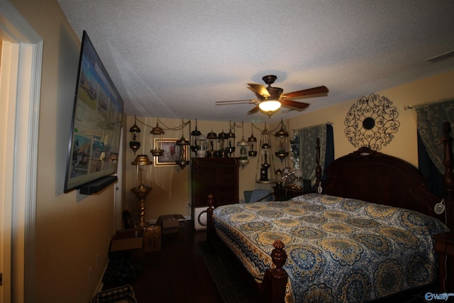207 Brook Wind Dr, Hazel Green, AL 35750 - bedroom featuring a textured ceiling, visible vents, and a ceiling fan