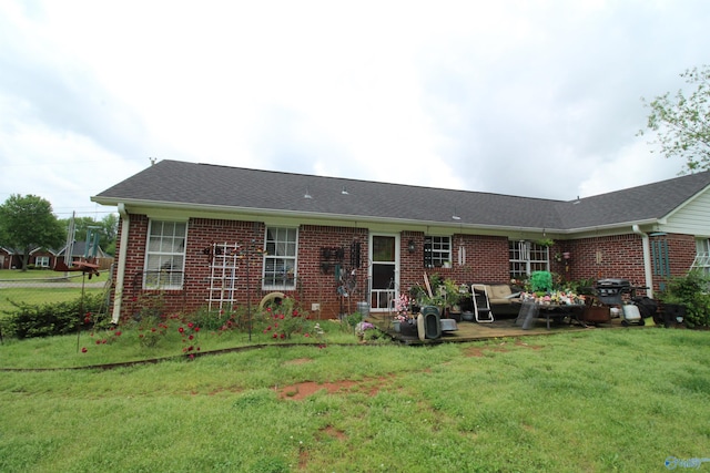 207 Brook Wind Dr, Hazel Green, AL 35750 - back of house featuring a patio, brick siding, fence, and a yard