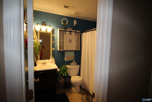 207 Brook Wind Dr, Hazel Green, AL 35750 - bathroom with curtained shower, visible vents, toilet, vanity, and tile patterned flooring
