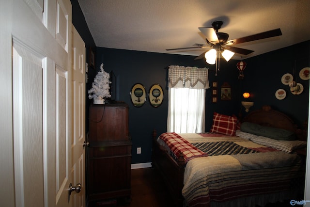207 Brook Wind Dr, Hazel Green, AL 35750 - bedroom featuring a ceiling fan, wood finished floors, and baseboards