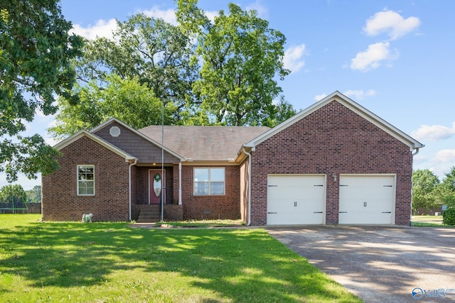 102 Landings Way Dr, Toney, AL 35773 - ranch-style house featuring an attached garage, brick siding, driveway, and a front lawn
