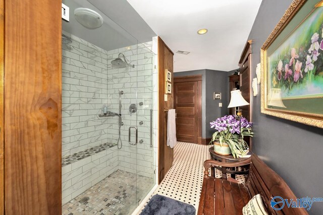 bathroom featuring an enclosed shower