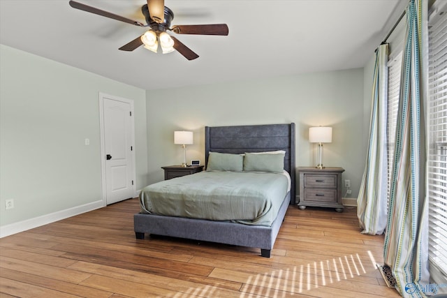 bedroom featuring ceiling fan and light hardwood / wood-style flooring