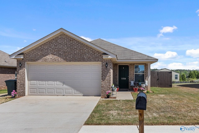 ranch-style home with a front yard, brick siding, driveway, and an attached garage