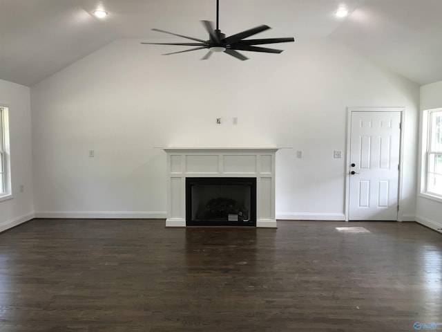 716 Ruby St, Gadsden, AL 35901 - unfurnished living room with a ceiling fan, a fireplace, dark wood-type flooring, and high vaulted ceiling