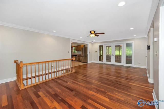 spare room with baseboards, a ceiling fan, and recessed lighting