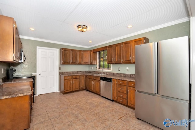 kitchen featuring brown cabinets, a sink, stainless steel appliances, crown molding, and recessed lighting